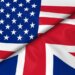 Flags of the United States and the United Kingdom overlapping each other.