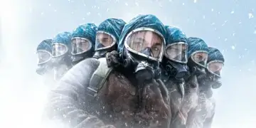 A group of individuals wearing gas masks and protective clothing in a snowy environment.