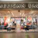 Exterior view of an American Eagle store featuring clothing displays and signage.