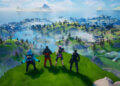 Four characters from Fortnite standing on a grassy hill overlooking a vibrant game landscape.