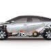 Cross-sectional view of a Nissan hybrid car showing internal components and structure.