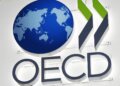 OECD logo featuring a globe and stylized arrows in green and gray colors.