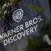 Sign displaying the Warner Bros. Discovery logo with the WB shield and company name.