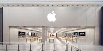 Exterior view of the Apple Store at Manchester Arndale with the Apple logo displayed prominently.