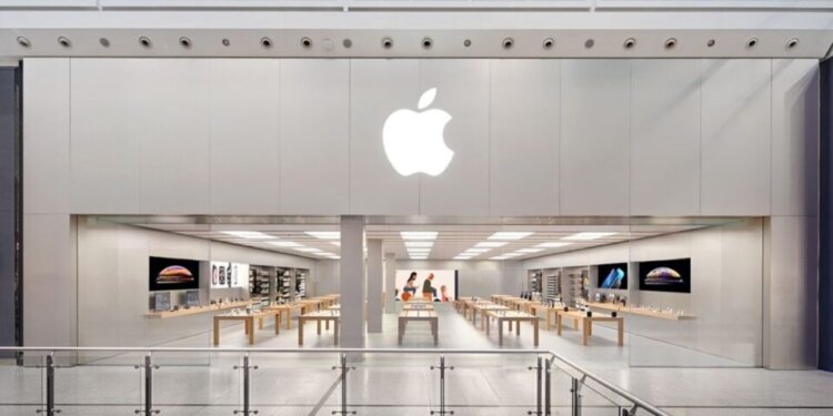 Exterior view of the Apple Store at Manchester Arndale with the Apple logo displayed prominently.
